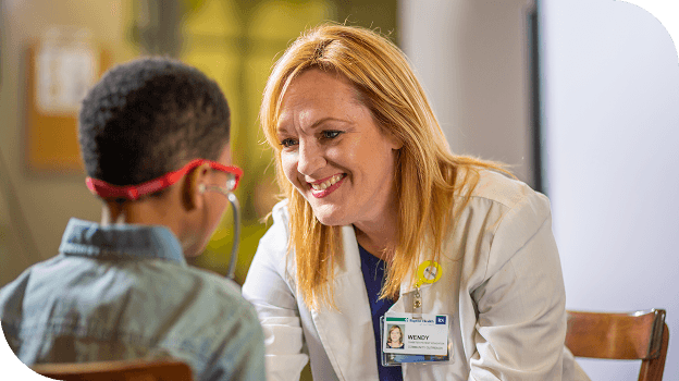 Doctor speaking to child